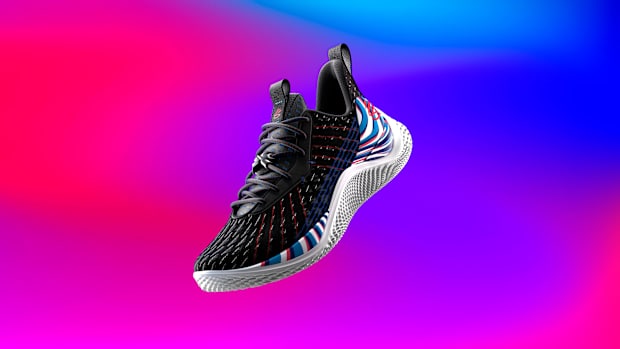 View of black and white Curry shoes.
